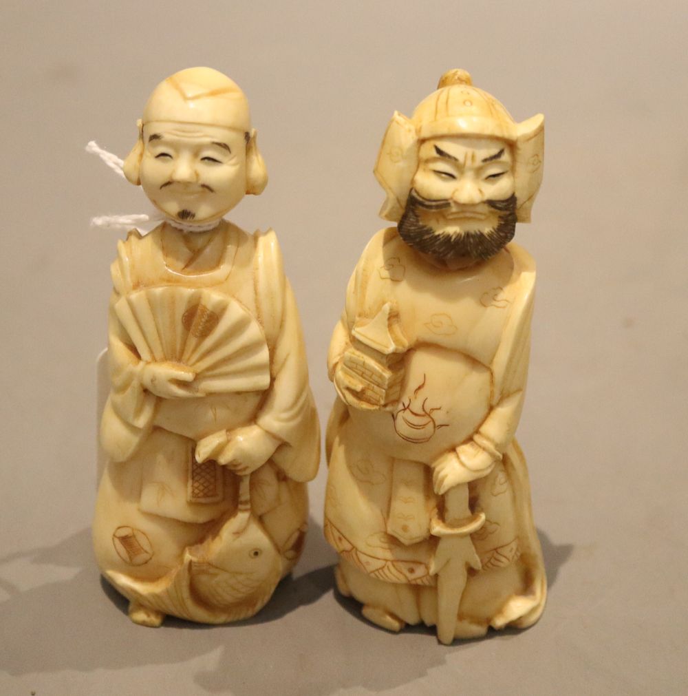 Two walrus ivory figures